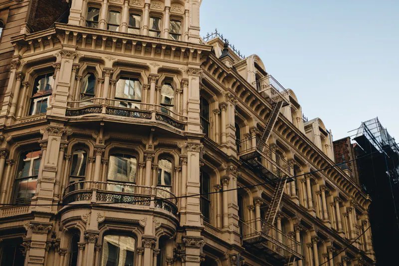 Ornate cast-iron facades in warm light